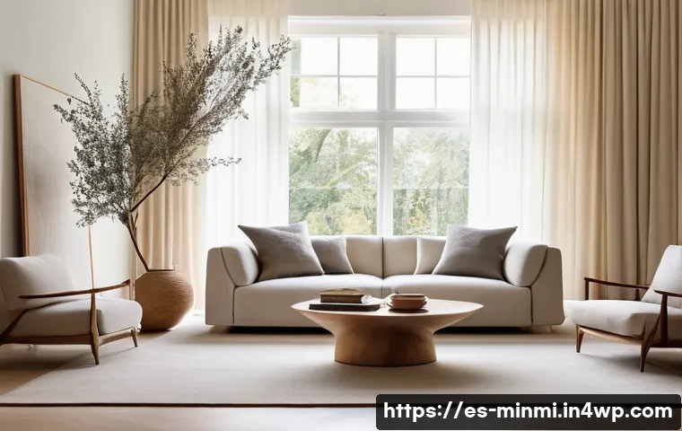 미니멀 럭셔리 디자인의 최신 트렌드 - **Prompt:** A minimalist living room bathed in soft, natural light, embodying silent luxury. The foc...